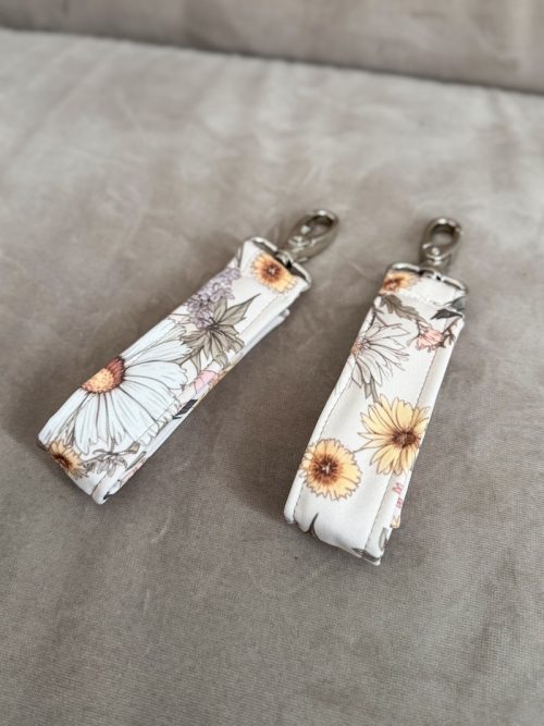 Zaczepy do wózka na torbę lub plecak rumianek